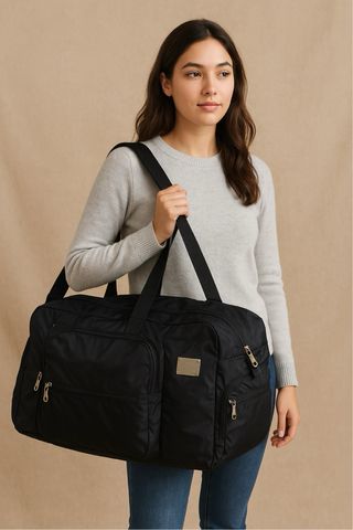 Bolsa de viaje Samsonite negra y fucsia