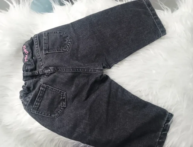 Pantalones vaqueros grises con flores