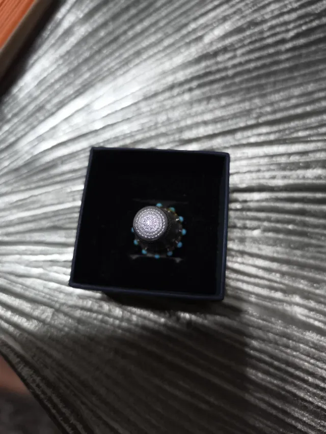 Dedal de plata y turquesas