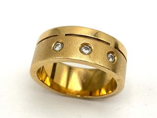 anillo oro 18k con diamante