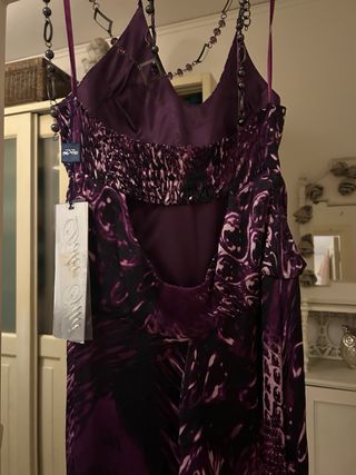 Tuta lunga viola con fantasia