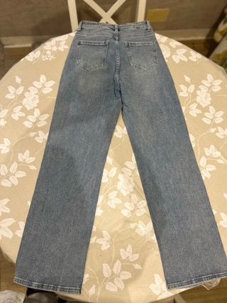 Jeans palazzo con strass