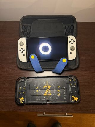 Nintendo Switch OLED + custodia + giochi + cover