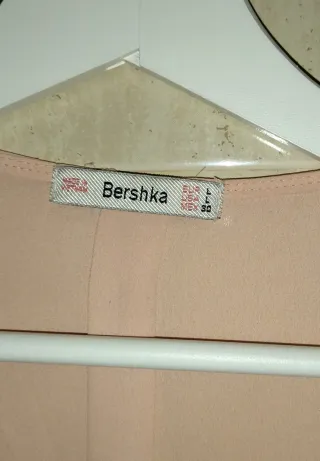 Blusa Bershka rosa con cremallera