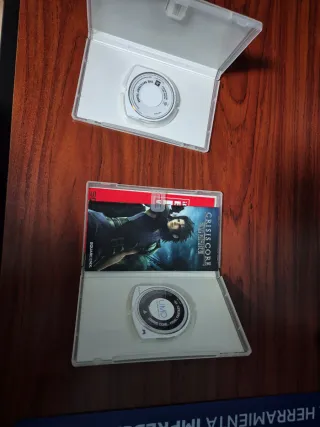 PSP gris plata con cargador y funda No bateria