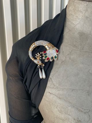 Spilla vintage pavone anni '90