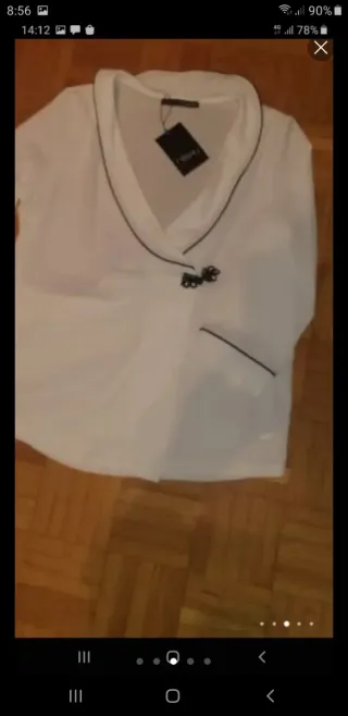 Blusa Sfera Blanca con etiqueta