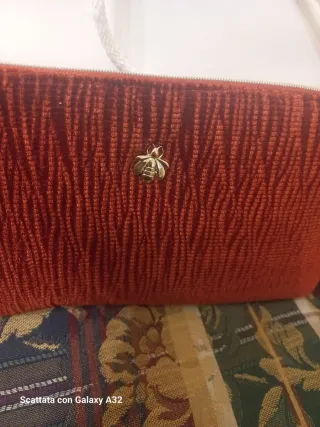 Pochette trucco Guerlain ape dorata