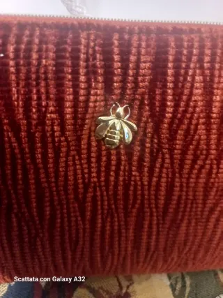 Pochette trucco Guerlain ape dorata