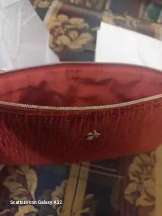 Pochette trucco Guerlain ape dorata