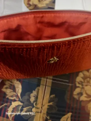 Pochette trucco Guerlain ape dorata