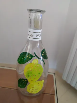 Bottiglia decorata con limoni