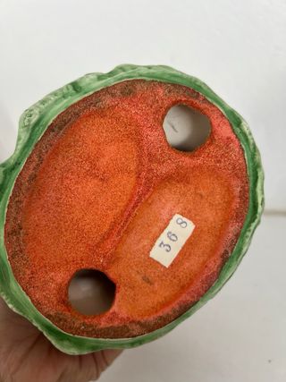 Figura vintage anciana con cántaro