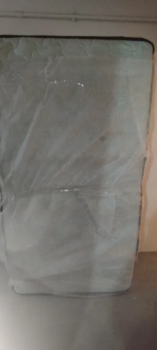 Colchón marca Clímax láminas madera 90x190 y patas