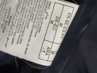 Plumas Pinkie azul con capucha y pelo