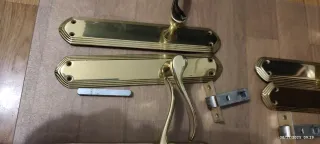 Manillas y picaportes dorados