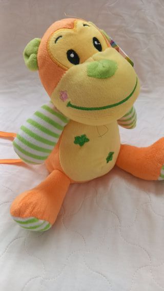Peluche scimmia arancione e gialla