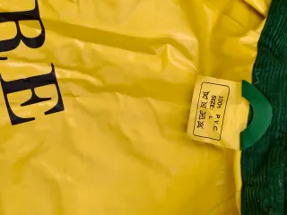 Chubasquero verde sin estrenar