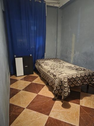 Habitación amueblada