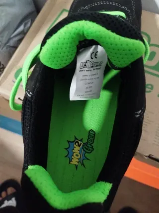Zapatos de seguridad U-Power negros y verdes