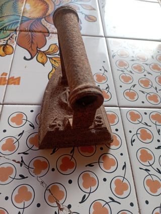 Vecchia piastra in ghisa