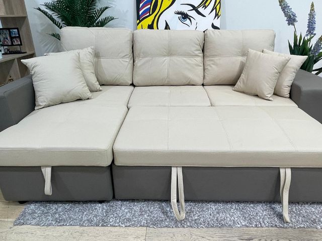 Sofá cama beige con arcón incorporado