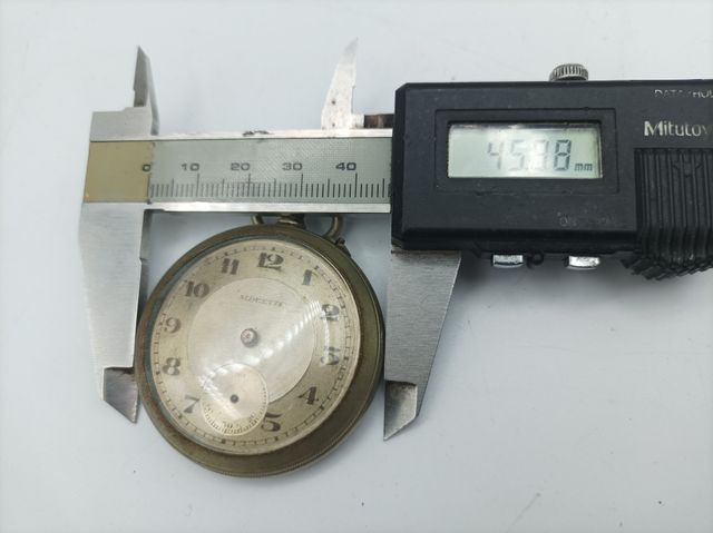 Reloj de bolsillo antiguo para reparar