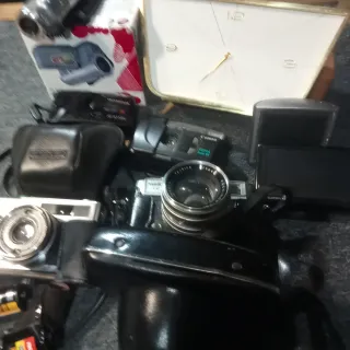 Lotto di vecchie fotocamere e tonton