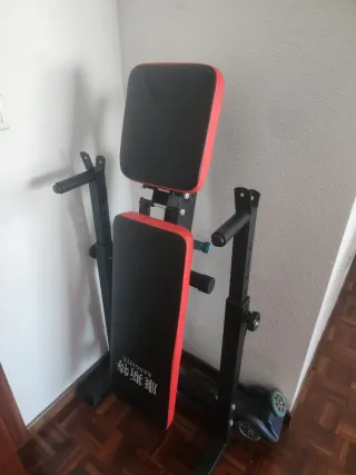 Banco de pesas ajustable+ barra,mancuernas y pesas