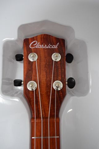 GUITARRA ACÚSTICA DE JUGUETE DE COLOR MARRÓN