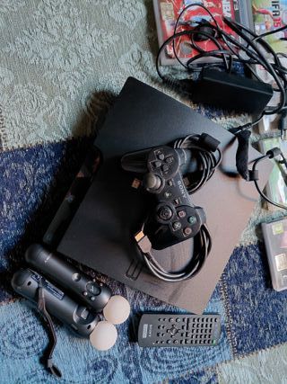 PS3 Sony con 2 motion controller e 9 giochi