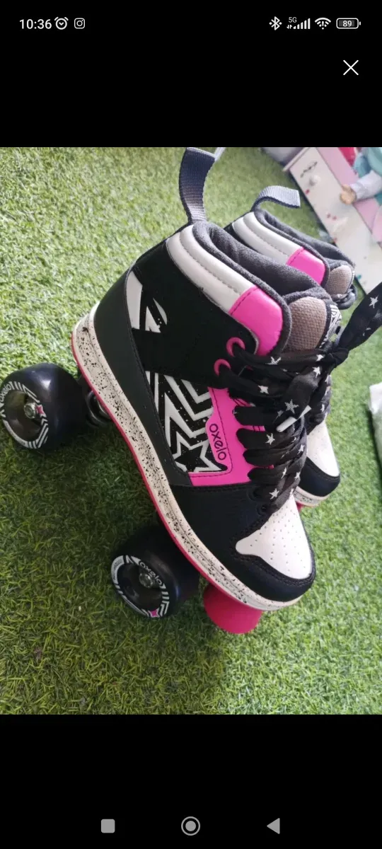Patines Oxelo negros y rosas