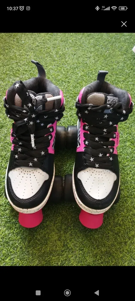 Patines Oxelo negros y rosas