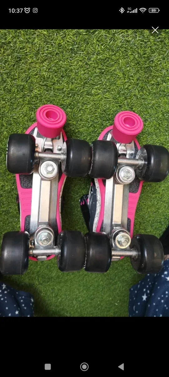 Patines Oxelo negros y rosas