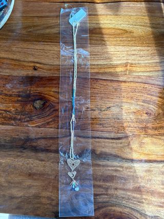 Collar largo Parfois Sol, Luna y Mano