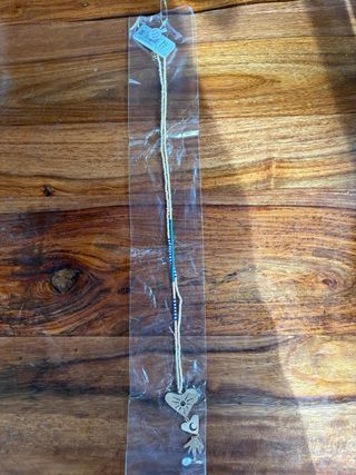 Collar largo Parfois Sol, Luna y Mano