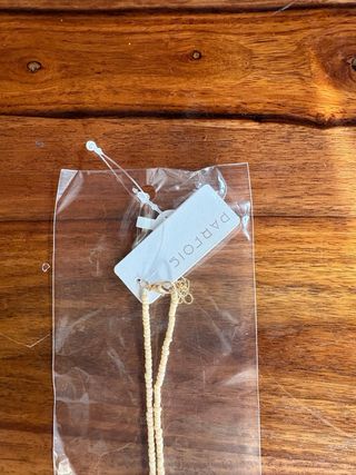 Collar largo Parfois Sol, Luna y Mano