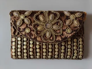 Bolso de fiesta marrón y dorado