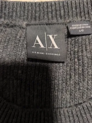 Jersey gris y azul con botones