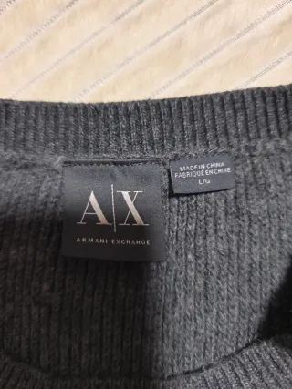 Jersey gris y azul con botones