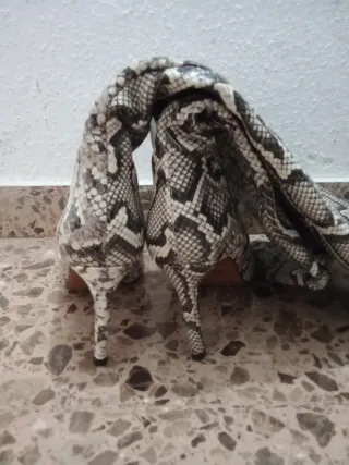 Botas altas animal print talla 36