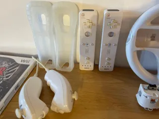 Lote Wii: ruedas Mario Kart, Wii Fit, 2 Mandos y +