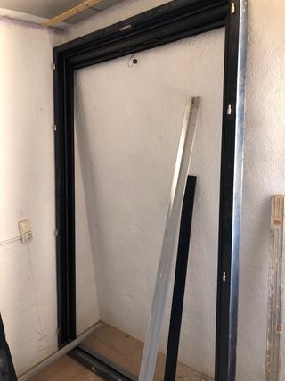 Puerta balconera doble hoja nueva