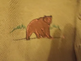 Gilet uomo con ricamo orso e cacciatore