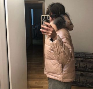 Chaqueta plumífero con capucha y pelo