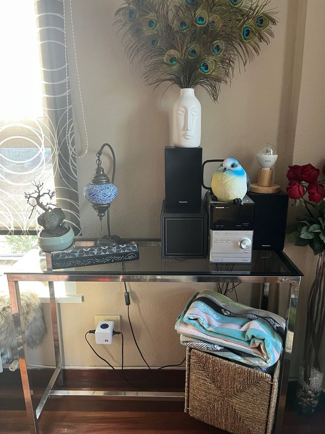 Tavolo in vetro e acciaio