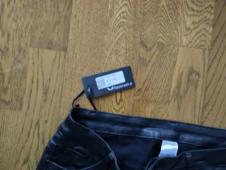 Pantalones efecto piel mujer