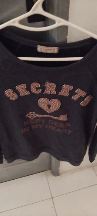 Sudadera mujer negra con detalles dorados Talla M