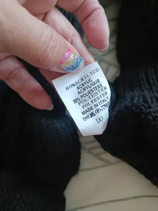 Jersey punto negro cuello vuelto