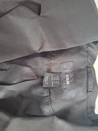 Chaqueta corta negra lazos